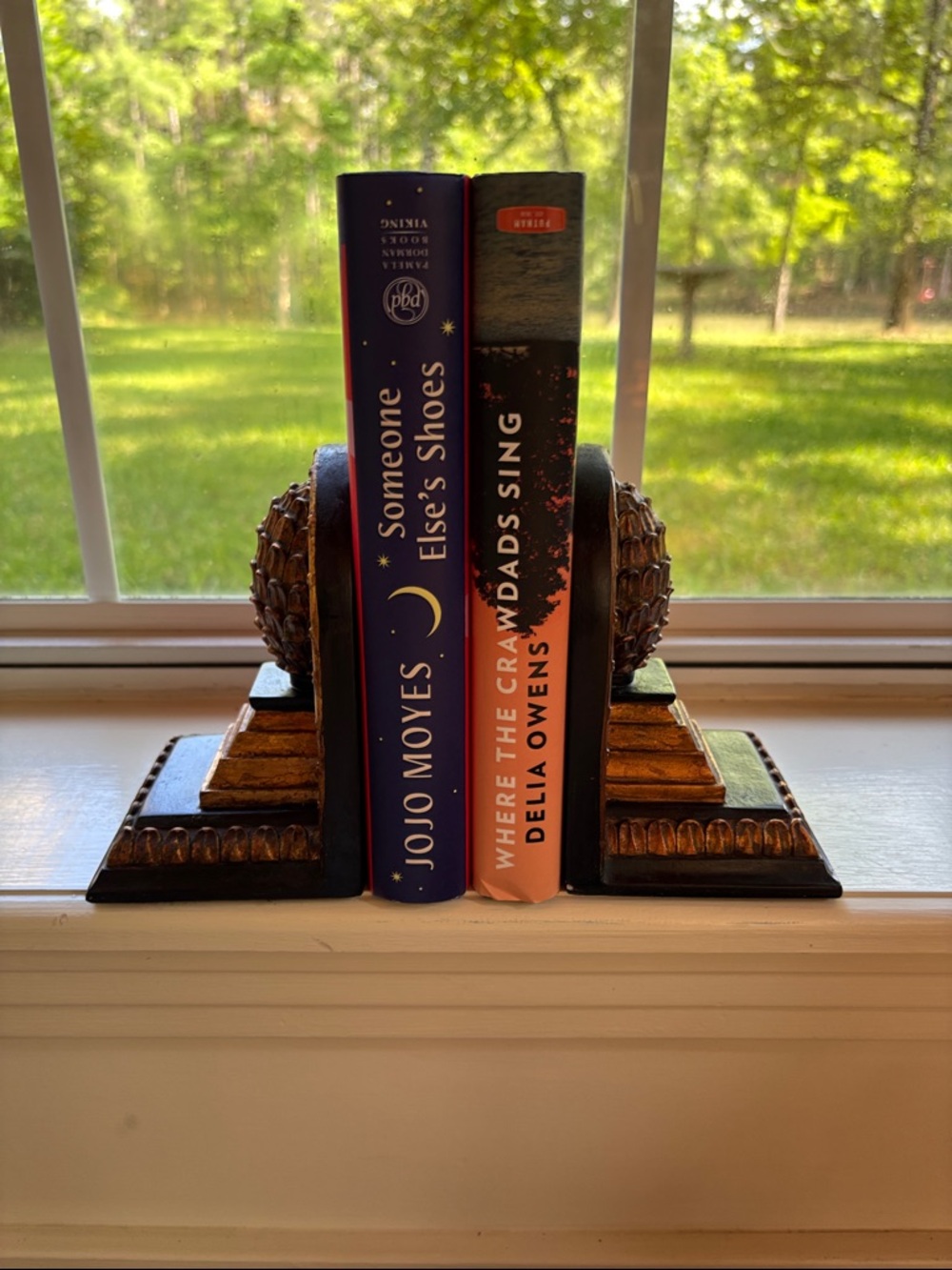 Set Of Bookends Featuring Pineapple Finial Design Atop A Tiered Base.